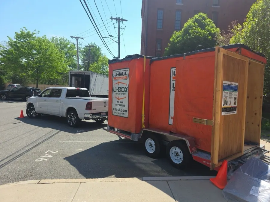Pickup truck hauling a U-Box storage container